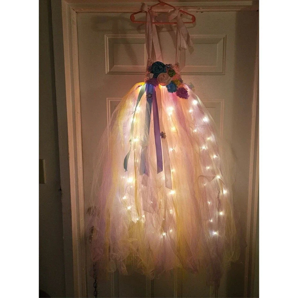 Unicorn Light Up Princess Dress it features a layered rainbow colored Size 10